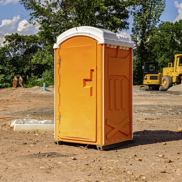 what is the cost difference between standard and deluxe portable restroom rentals in Bluetown Texas